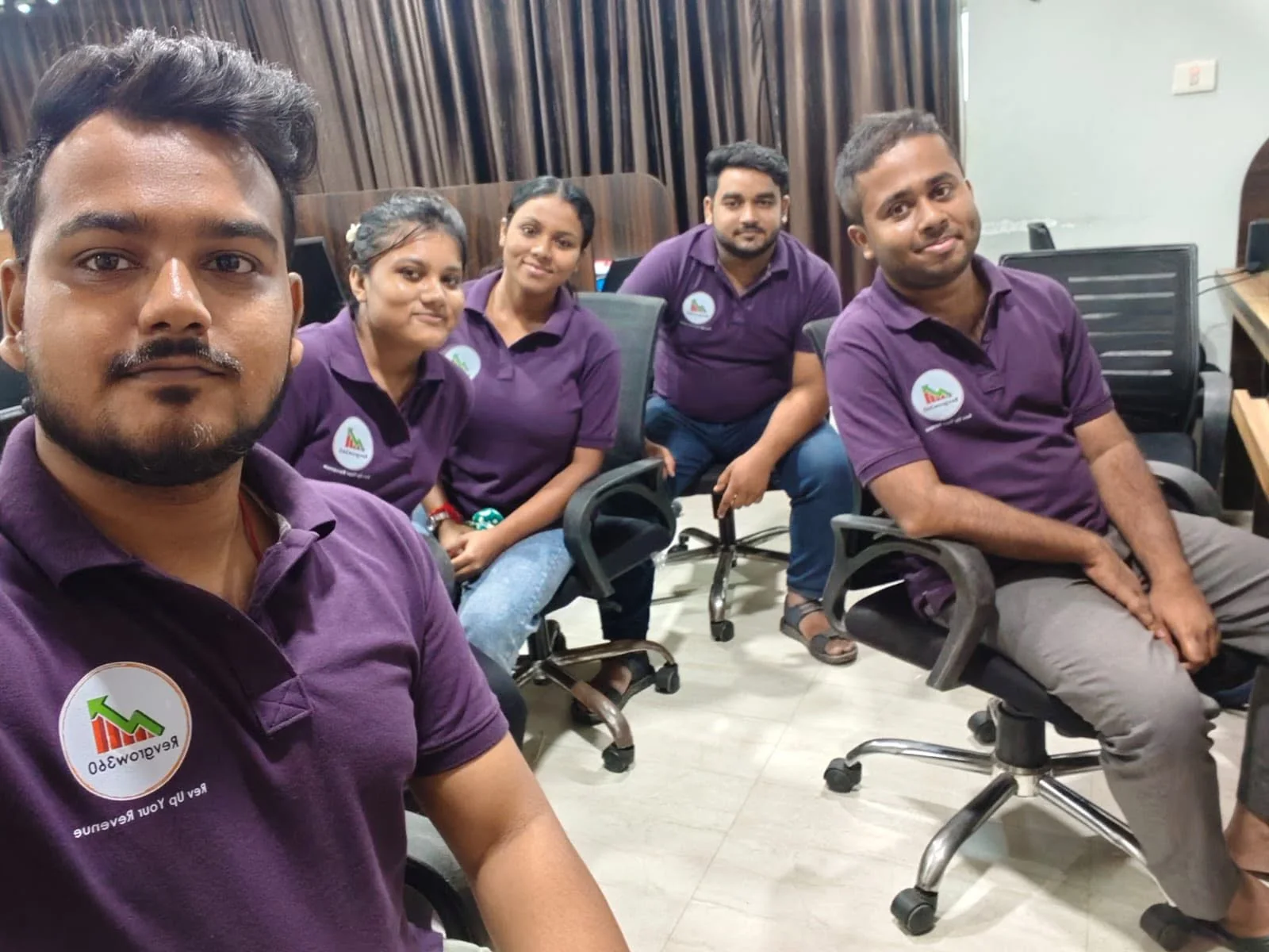 Revgrow360 team in uniform at the office
